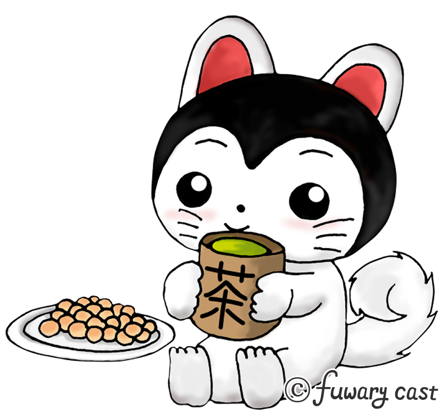 犬張子のこまがたまごボーロを食べながらお茶を飲んでいます